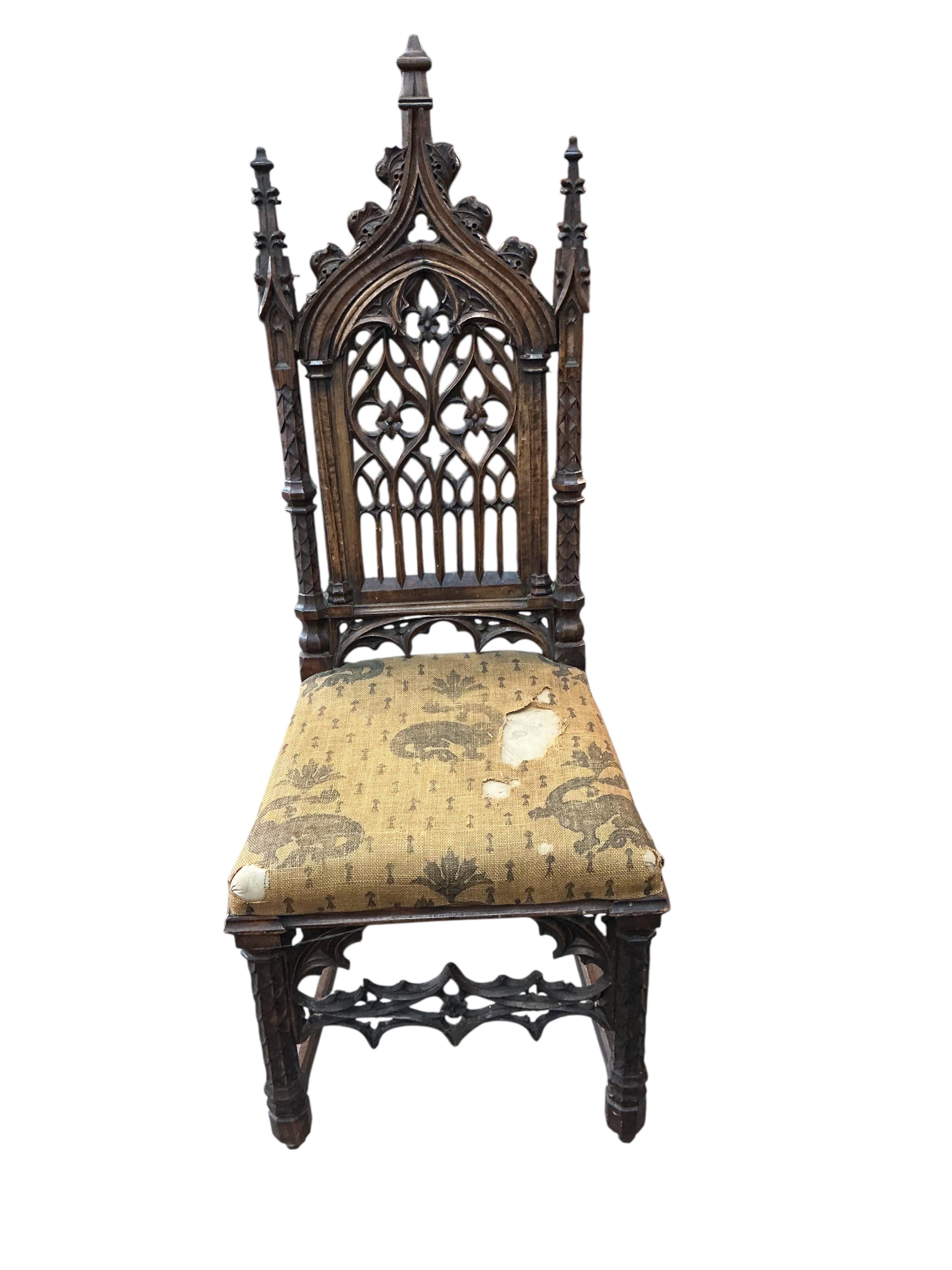 Attributed to Ferdinand Rothbart, a Victorian carved walnut Gothic Revival side chair, width 38cm, depth 41cm, height 113cm